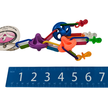 Top This bird toy by Super Bird Creations, shown with ruler to shown length