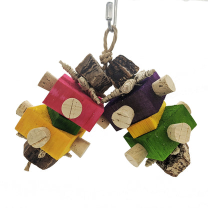 Chewie by Lil Monsters Bird Toys. Made with balsa, corks, mahogany pod slices, and vine stars.