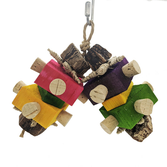 Chewie by Lil Monsters Bird Toys. Made with balsa, corks, mahogany pod slices, and vine stars.