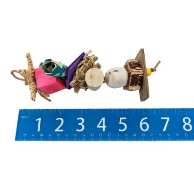 Lazy Monster Sampler by Lil Monsters Bird Toys, next to ruler for scale