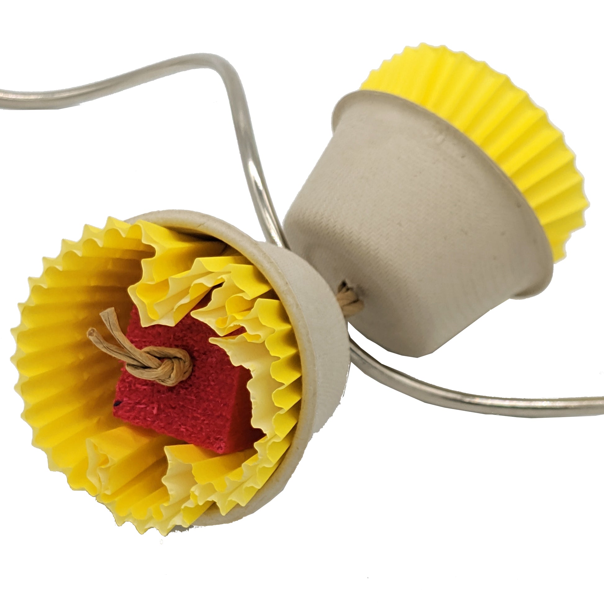 A bird toy shown on a skewer. Consists of plant based fiber cups with cupcake liners and 1 inch balsa blocks tucked inside. 
