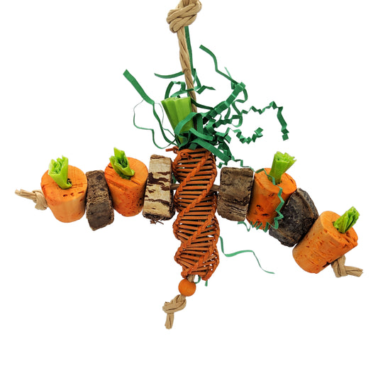 Carrot Patch by Lil Monsters Bird Toys. A Carrot themed Easter parrot toy with vine, corks, mahogany pods, cupcake liners, and shredded paper. 