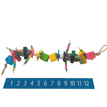Cravings by Lil Monster Bird Toys. Next to ruler for scale. 