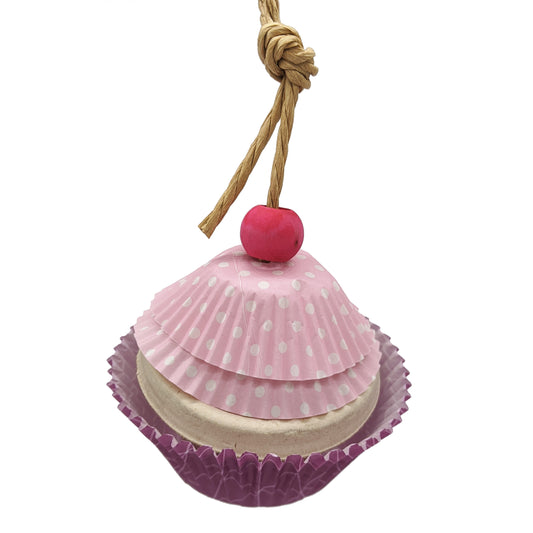 Cupcake Forager by Lil Monsters Bird Toys. A toy designed to resemble a cupcake with cupcake papers, a foraging cup, and a bead on top.
