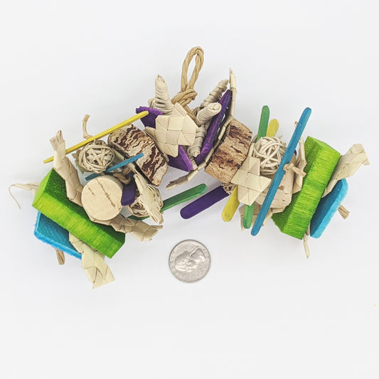 Koopa by Lil Monsters Bird Toys, next to a US quarter for scale. 