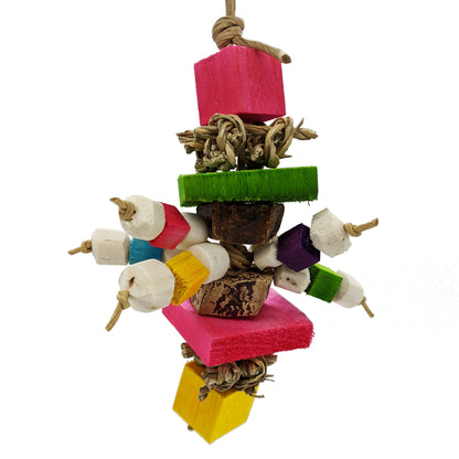 Sprite by Lil Monsters Bird Toys. Made with balsa, seagrass, mahogany pod slices, and sola. 