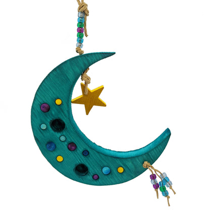 Sweet Dreams by Lil Monsters Bird Toys. A Crescent Moon Shaped Bird toy or swing, shown in a teal color. 